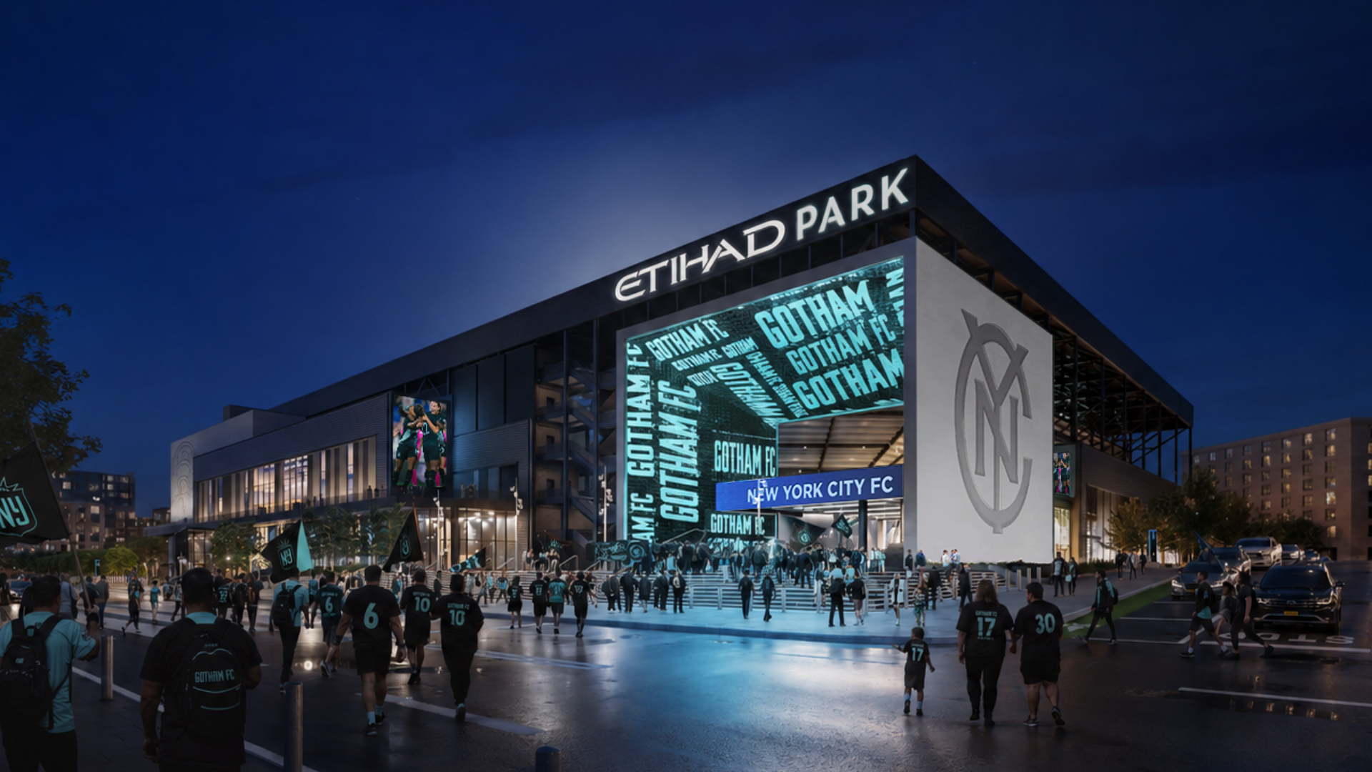 Etihad Park exterior with Gotham FC branding at night